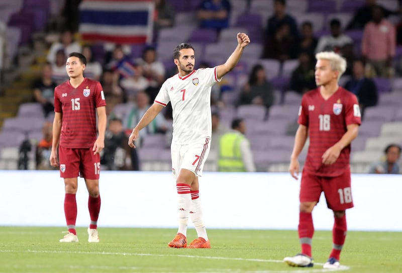 Al Ain, United Arab Emirates - January 14, 2019: Ali Mabkhout of UAE scores during the game between UAE and Thailand in the Asian Cup 2019. Monday, January 14th, 2019 at Hazza Bin Zayed Stadium, Al Ain. Chris Whiteoak/The National