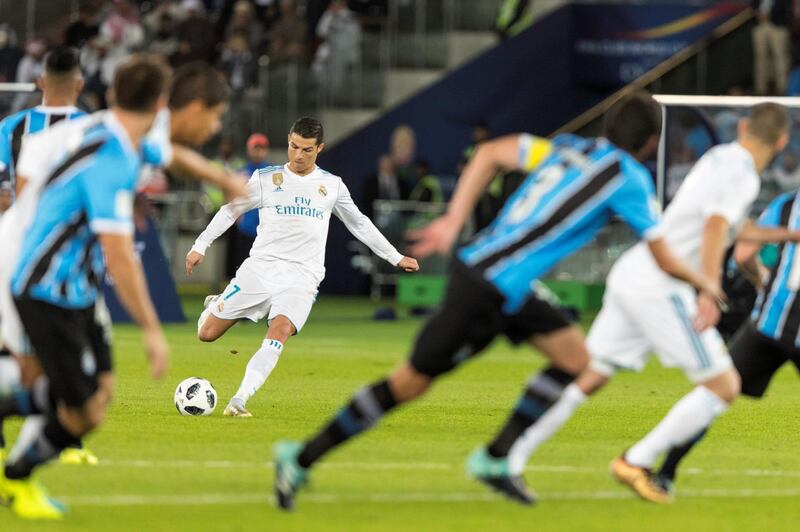 Abu Dhabi, United Arab Emirates, December 16, 2017:    Real Madrid's Cristiano Ronaldo scores against Gremio during the FIFA Club World Cup championship football match at Zayed Sports City Stadium in Abu Dhabi on December 16, 2017. Christopher Pike / The National

Reporter: John McAuley
Section: Sport