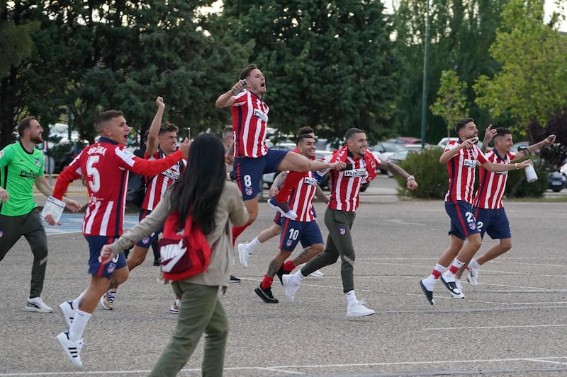 Atletico Madrid´s players celebrate outside the Jose Zorilla stadium in Valladolid after being crowned La Liga champions. AFP