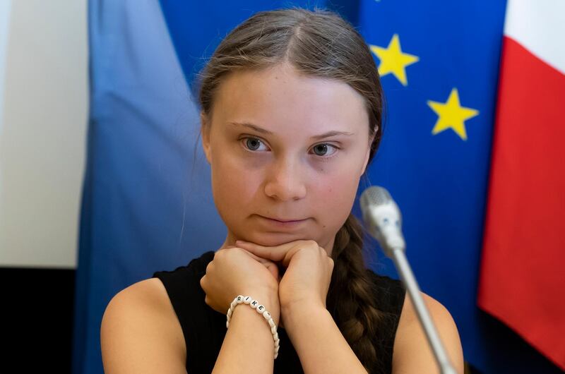 epa07735314 Swedish climate activist Greta Thunberg arrives to deliver a speech at the Assemblee Nationale, French parliament, in Paris, France, 23 July 2019. Teenage climate activist Greta Thunberg, who sparked the #FridaysForFuture school strike movement, attended a conference with young climate activists at the National Assembly.  EPA/IAN LANGSDON