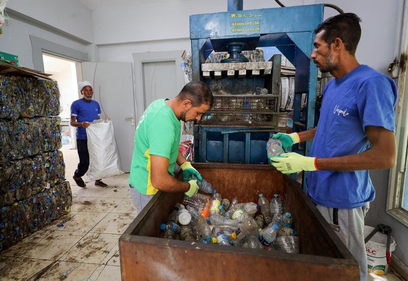 Mohamed Nasar, 58, delivers plastic waste he collected from the Nile to the recycling factory in Giza. Reuters