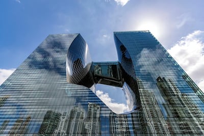 Dubai, United Arab Emirates - Reporter: N/A: The Opus building has its windows cleaned in Business Bay. Wednesday, March 4th, 2020. Business Bay, Dubai. Chris Whiteoak / The National