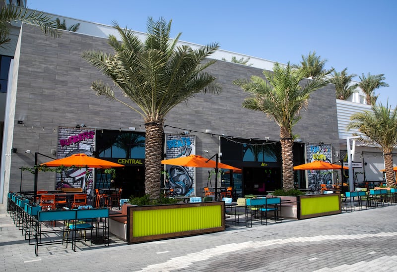 Central's outdoor dining area, which also has views of the waterfront as well as Al Raha skyline.