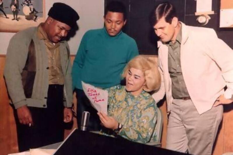 Etta James, seated, rehearses as bandmates and the owner of Fame Studios, Rick Hall, right, look on during a recording session circa 1967 in Muscle Shoals, Alabama. House Of Fame LLC / Michael Ochs Archive / Getty Images
