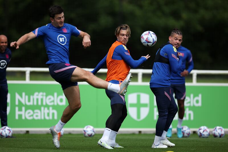 Jack Grealish and Kalvin Phillips react as Harry Maguire makes a pass.