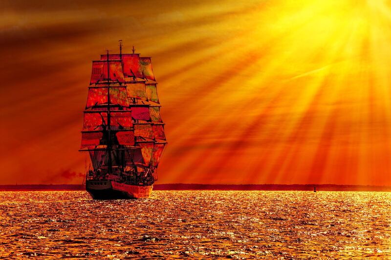 DD0JTF Sailing ship on the sea at sunset skyline.