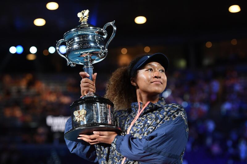 Naomi Osaka with the Daphne Akhurst Memorial Cup after sealing a 6-4, 6-3 against Jennifer Brady in the Australian Open final at Melbourne Park on February 20. Getty