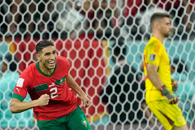 Morocco's Achraf Hakimi turns away after scoring the winning penalty in the shoot-out against Spain at Education City Stadium. AP