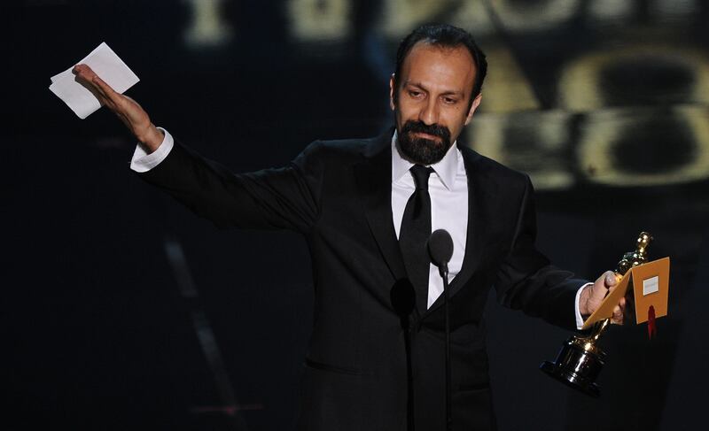Director for Iran's Foreign Language entry "A Separation," Asghar Farhadi addresses the audience onstage at the 84th Annual Academy Awards on February 26, 2012 in Hollywood, California. AFP PHOTO Robyn BECK
