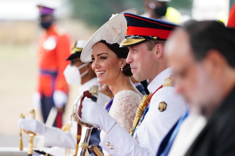 The couple attend the inaugural commissioning parade for service personnel from across the Caribbean who have recently completed the Caribbean Military Academy's officer training programme, in Kingston.