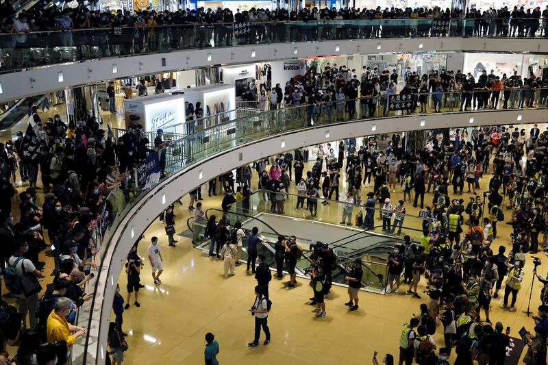 Anti-government protesters stage a rally at a shopping mall in Hong Kong, China. REUTERS