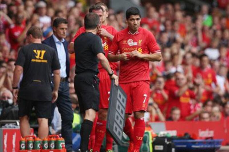 Luis Suarez has asked Liverpool not to renege on the clause in his contract.