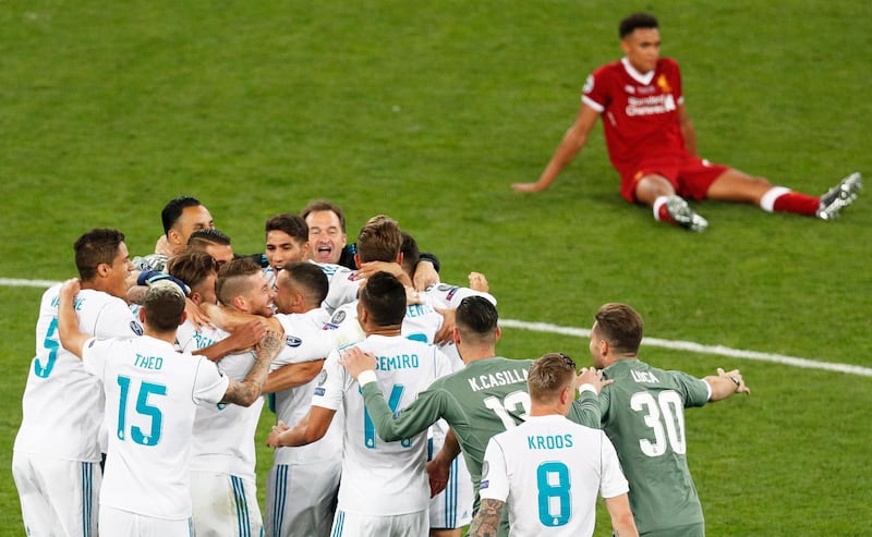 Real Madrid players celebrate their win. Robert Ghement / EPA