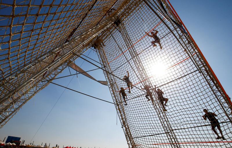 Organisers say Tough Mudder is designed to drag you out of your comfort zone by testing your physical strength and mental grit. Reuters