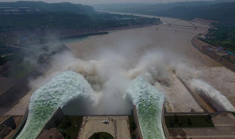 Water is released from the floodgates of the Xiaolangdi dam on the Yellow River near Luoyang, in China’s Henan province on June 29, 2016. The floodgates are opened every year in an operation to flush millions of tonnes of silt from the river bed. Agence France-Presse