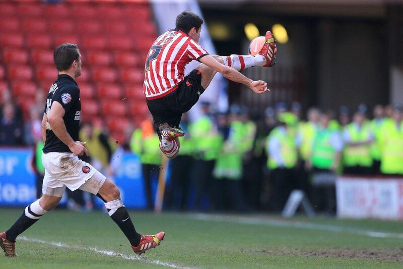 Left midfield: Ryan Flynn, Sheffield United. Took his goal against Charlton beautifully as Sheffield advanced to the last four of the FA Cup. Nick Potts / PA / AP