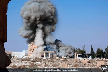 In 2017 ISIS released this picture of militants blowing up the 2,000-year-old temple of Baalshamin in Syria's ancient city of Palmyra. The new Getty fund is concerned to protect against actions such as these. / AP
