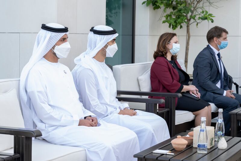 Sheikh Mohamed bin Hamad bin Tahnoon, Private Affairs Adviser in the Ministry of Presidential Affairs, and Sheikh Hamdan bin Mohamed bin Zayed, attend a meeting with Pedro Sanchez, Prime Minister of Spain (not shown) at Al Shati Palace. 