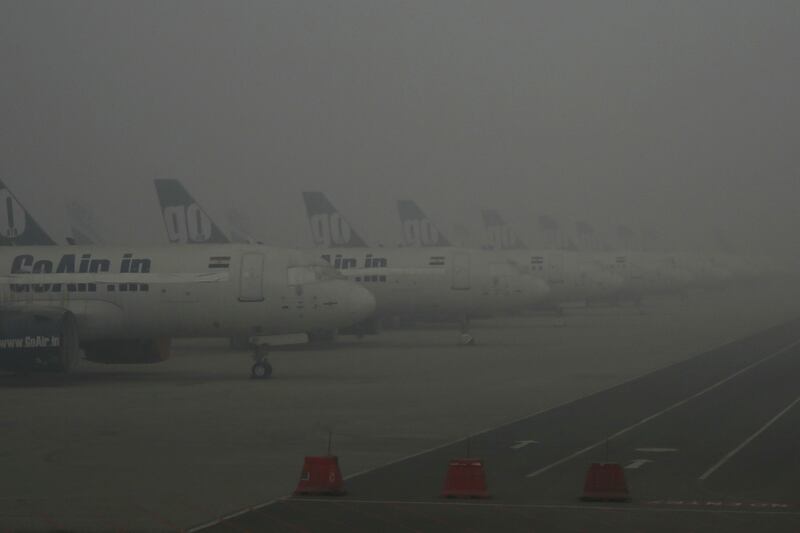 Aircraft at the taxiways on a winter morning at Indira Gandhi International Airport in New Delhi. AFP