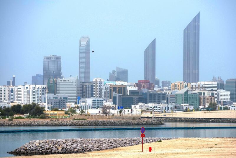 Abu Dhabi, United Arab Emirates, April 20, 2020. 
  Downtown Abu Dhabi shot from Al Reem Island on a hazy day.
Victor Besa / The National
Section:  NA
For:  Stock images