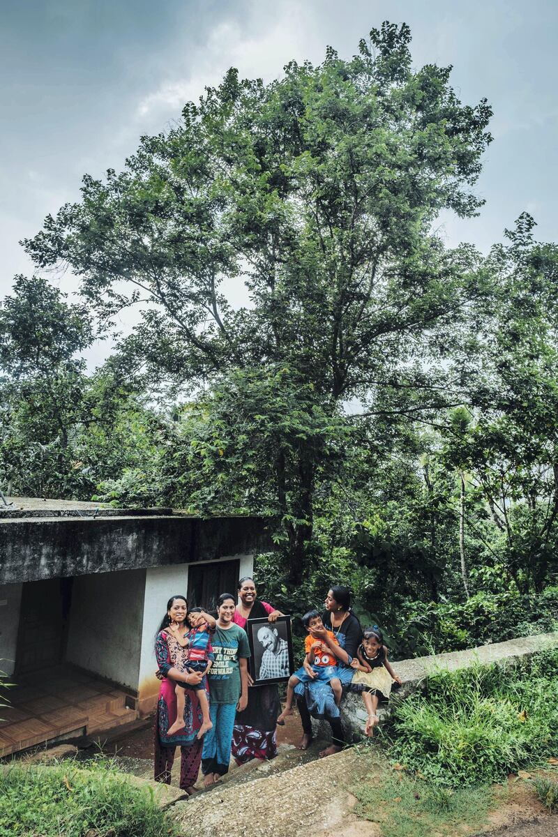 Joy's family house  is set against a beautiful hillside. Living here is his wife Mini and his two kids Diana and Abel. His mother in law Cherupushmam and her his sister in law Smitha along with his niece Alina and nehew Joyal came round to us today for this photo.