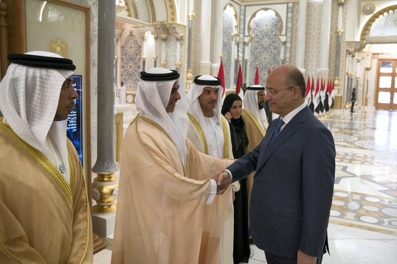 ABU DHABI, UNITED ARAB EMIRATES - November 12, 2018: HE Dr Barham Salih, President of Iraq (R), greets HH Lt General Sheikh Saif bin Zayed Al Nahyan, UAE Deputy Prime Minister and Minister of Interior (2nd L), during a reception held at the Presidential Palace. Seen with HH Sheikh Mansour bin Zayed Al Nahyan, UAE Deputy Prime Minister and Minister of Presidential Affairs (L), HH Sheikh Hazza bin Zayed Al Nahyan, Vice Chairman of the Abu Dhabi Executive Council (3rd L), HE Dr Amal Abdullah Al Qubaisi, Speaker of the Federal National Council (FNC) (4th L) and HH Sheikh Tahnoon bin Mohamed Al Nahyan, Ruler's Representative in Al Ain Region (5th L).
( Hamad Al Kaabi / Ministry of Presidential Affairs )?
---