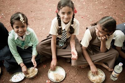 Children eat meals provided by the Akshaya Patra Foundation and the Indian government. Photo: Akshaya Patra Foundation