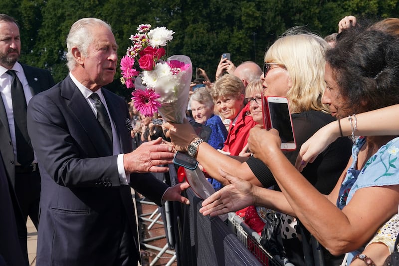 King Charles outside Buckingham Palace on Friday. AP