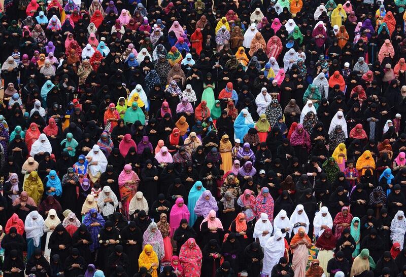 Indian Muslim devotees offer Eid prayers during an Eid al-Fitr festival in Chennai, India. AFP

