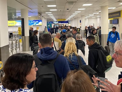 Passengers queue for security at Gatwick Airport. Photo: Diego Garcia Rodriguez / PA
