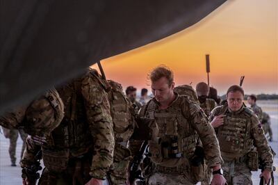 Joint Forces board the C-130 in RAF Akrotiri, Cyprus, bound for Sudan to evacuate British diplomats and their families. Reuters