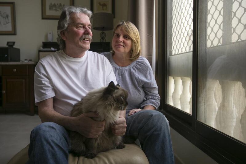 Klaus-Dieter Bielitz, 56, and his wife Jennifer have spoken of how a team of vets saved his life after he suffered a heart attack outside their clinic. They performed chest compression in the street and fitted an oxygen mask last used on a German shepherd. Mona Al Marzooqi / The National 