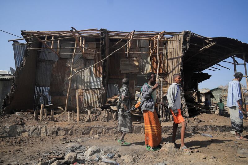 Houses destroyed by an airstrike during fighting in Tigray in February 2022. The war created famine-like conditions for hundreds of thousands. Reuters