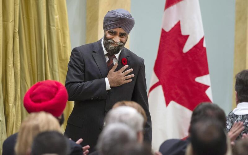Defense minister Harjit Sajjan is sworn in to his new role in Ottawa on November 4, 2015. Justin Tang/The Canadian Press via AP