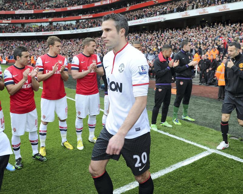 LONDON, ENGLAND - APRIL 28:  Manchester United's Robin van Persie walks through Arsenal's Guard Of Honour before the Barclays Premier League match between Arsenal and Manchester United at Emirates Stadium on April 28, 2013 in London, England.  (Photo by Stuart MacFarlane/Arsenal FC via Getty Images)