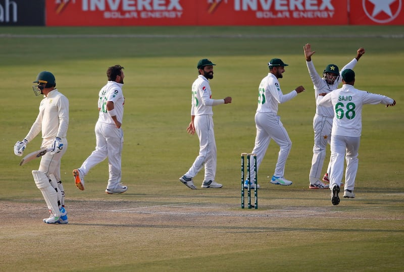 Pakistan celebrate the wicket of South Africa's Rassie van der Dussen for 64. AP