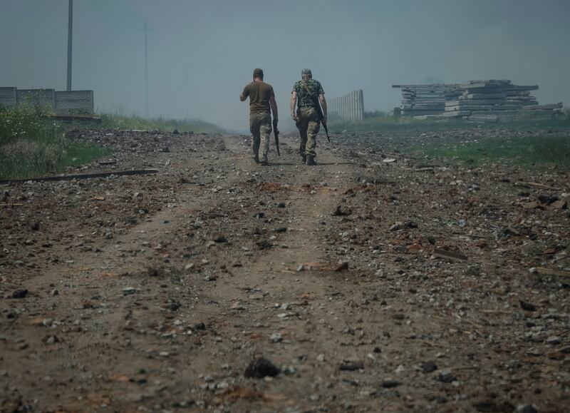 Ukrainian service members near the town of Soledar. Reuters