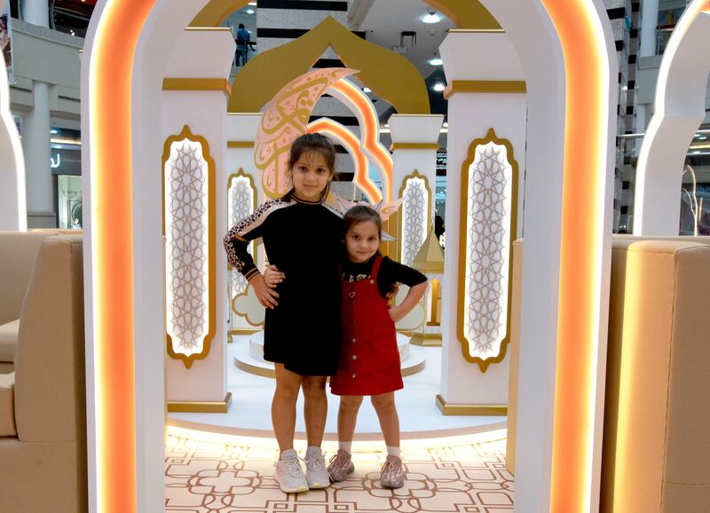 Children enjoy the festive Ramadan decor at Al Wahda Mall, Abu Dhabi. Victor Besa / The National