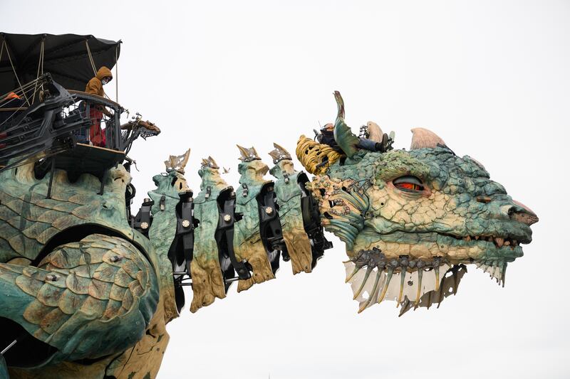 The Dragon of Calais carries members of the public along the renovated seafront in Calais, France. Getty Images