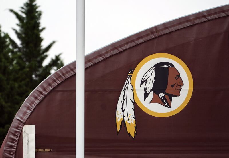 A Washington Redskins logo stands outside of FedEx Field in Landover, Maryland. Getty Images / AFP