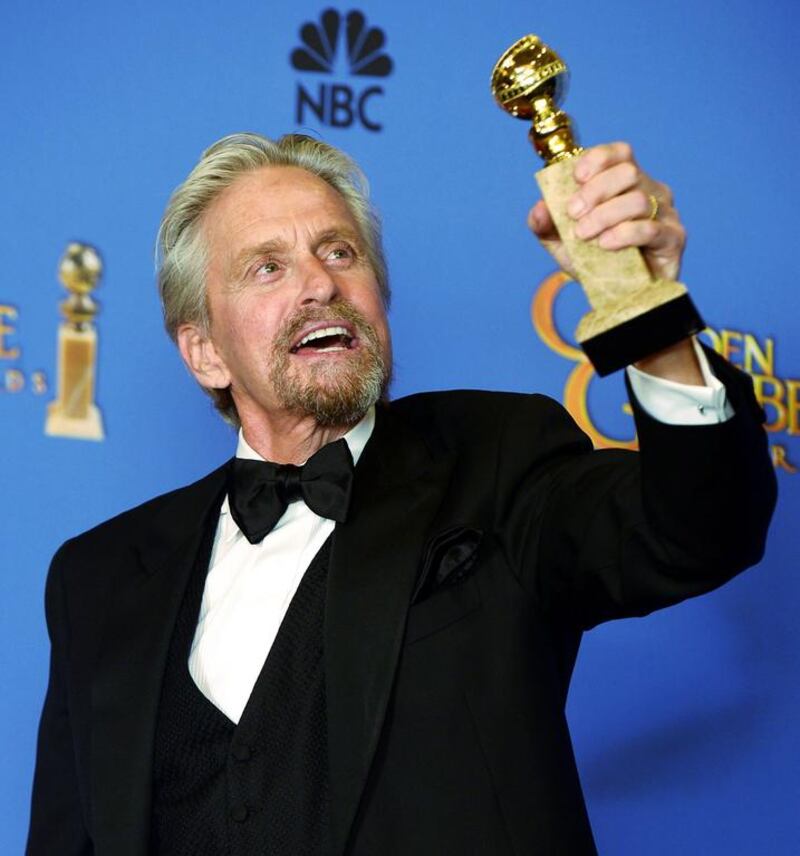 US actor Michael Douglas holds the Golden Globe for Best Performance by an Actor in a Mini-Series or Motion Picture made for television for Behind the Candelabra. EPA 