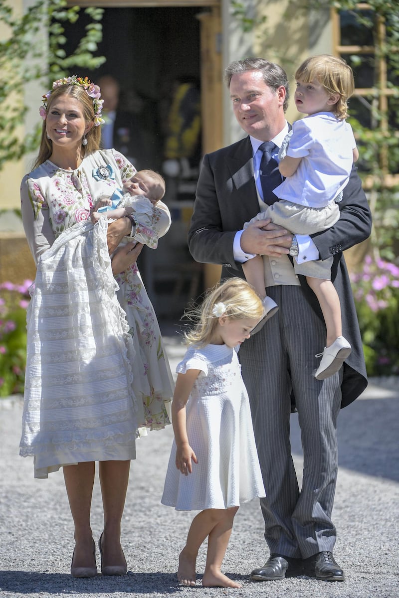 (L-R) Princess Madeleine of Sweden, princess Adrienne of Sweden, princess Leonore of Sweden, Mr Christopher O'Neill and prince Nicolas of Sweden are pictured after Princess Adrienne's christening ceremony in Drottningholm Palace Chapel in Stockholm, Sweden on June 8, 2018. - Princess Adrienne is princess Madeleine's and Mr Christopher O'Neill's third child. (Photo by Henrik MONTGOMERY / various sources / AFP) / Sweden OUT