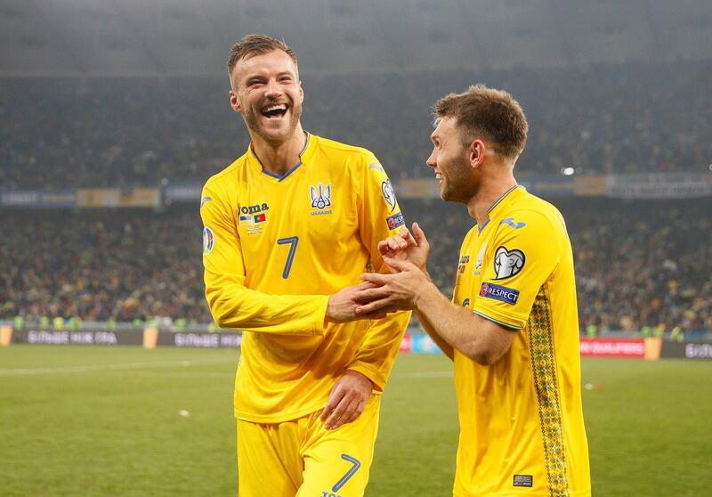 Ukraine's Andriy Yarmolenko celebrates scoring to make it 2-0. Reuters