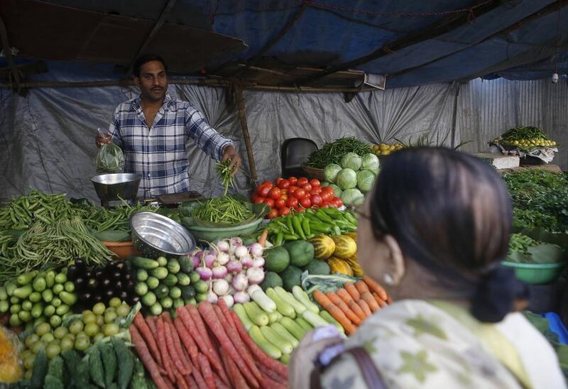 Consumer price index inflation declined to 9.87 per cent last month. Danish Siddiqui / Reuters