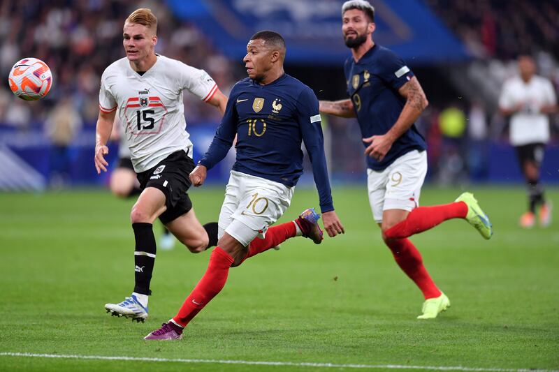 Kylian Mbappe of France fights for possession. Getty Images