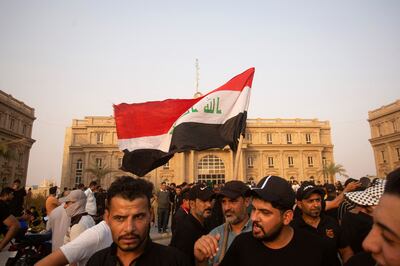 Supporters of Iraqi Shiite cleric Moqtada Al Sadr outside a government building during a demonstration in Basra. AFP