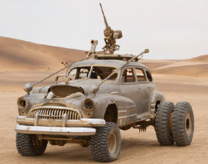 Buick Heavy Artillery with Hummer Weapon Mount: beaten and polished, the Buick is the standard bearer and personal guard for the The Gigahorse and Immortan Joe
