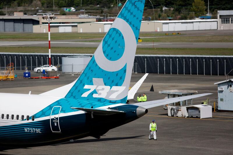 (FILES) In this file photo taken on April 13, 2017 A Boeing 737 MAX 9 taxis following a landing during a first-flight event for the company's new airplane at Boeing Field in Seattle, Washington.  The head of the embattled 737 MAX program plans to retire, Boeing said on July 11, 2019, as the company gears up to persuade regulators to return the plane to service after two deadly crashes. Eric Lindblad, who has led the Boeing program since August 2018, will step down and work with his successors on a transition, Commercial Airplanes President Kevin McAllister said in a staff memo. The 737 MAX has been grounded since mid-March following two crashes that claimed 346 lives. / AFP / Jason Redmond
