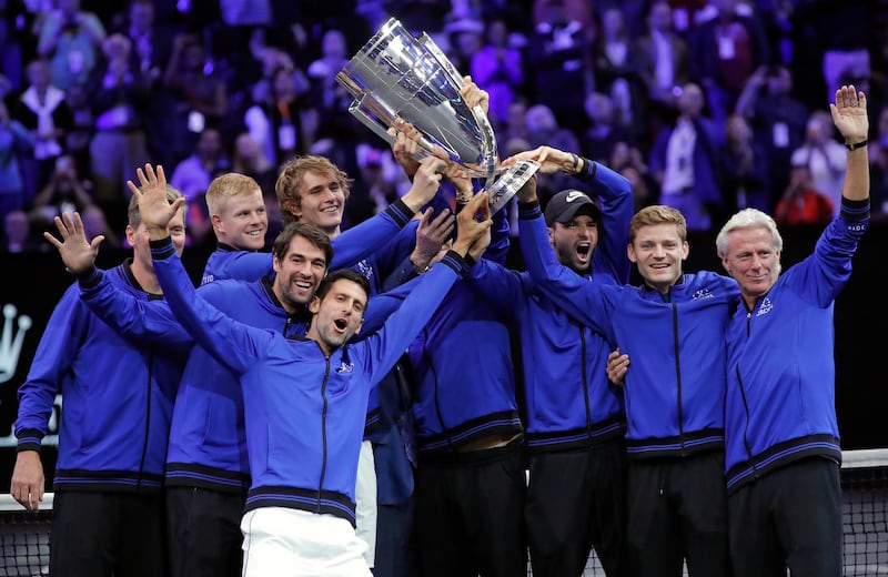 Team Europe celebrates with the Laver Cup after defeating Team World in the Laver Cup tennis tournament, Sunday, Sept. 23, 2018, in Chicago. (AP Photo/Jim Young)
