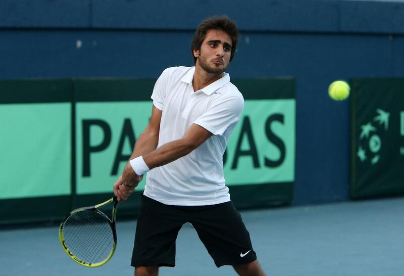 Hamad Janahi of UAE playing against Shahin Khaledan of Iran in the Davis Cup tennis tournament held at Aviation Club in Dubai. The UAE are looking to a more concerted bid for a place in the Davis Cup’s Group II next year after failing to take their chances at home this week. Pawan Singh / The National. 